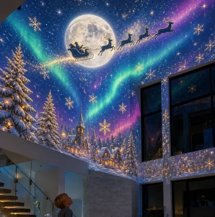 Christmas sky with Santa, northern lights and snowy village projected on a wall